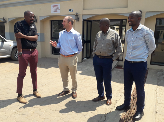 Zambia COHESA team members Raymond Hamoonga (left) and Musso Munyeme (2nf left), Joseph Chizumu, National AMR Coordinator (right) with COHESA project lead Theo Knight - Jones (2nd left) during the One Health Strategic Plan development meeting in Zambia.